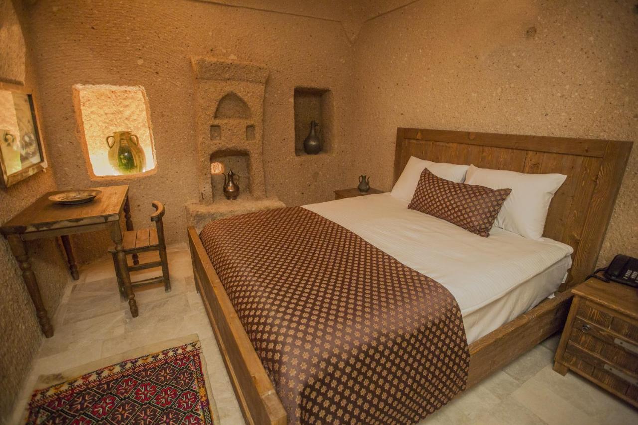 Helike Cave Suites Учгісар Номер фото